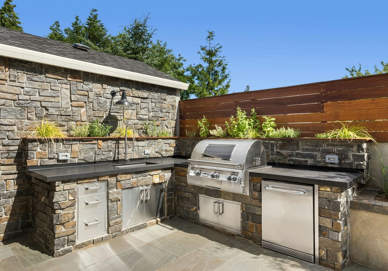 outdoor built in kitchen with bbq